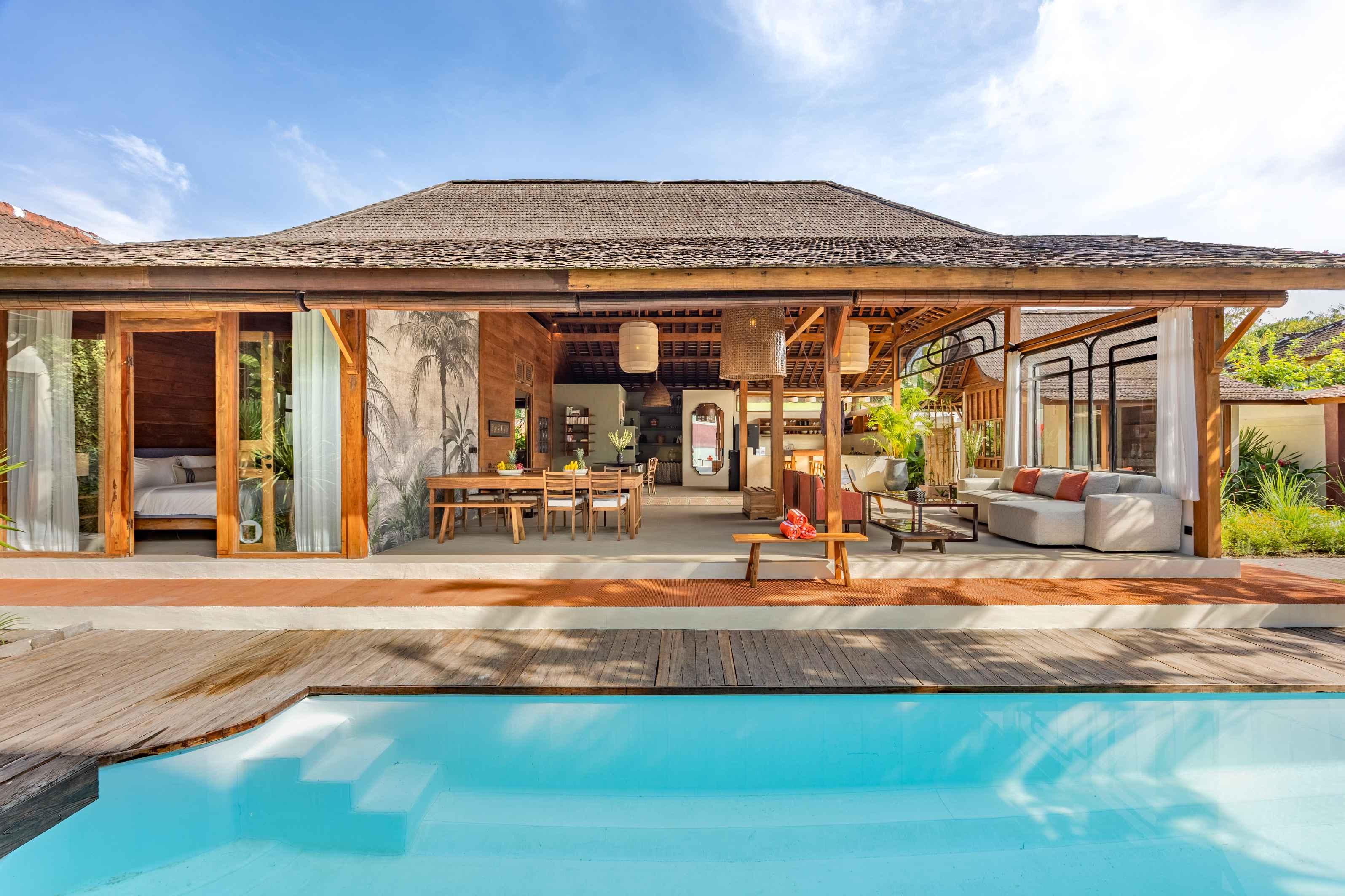 Sunset view from a Bambu Complex villa pool